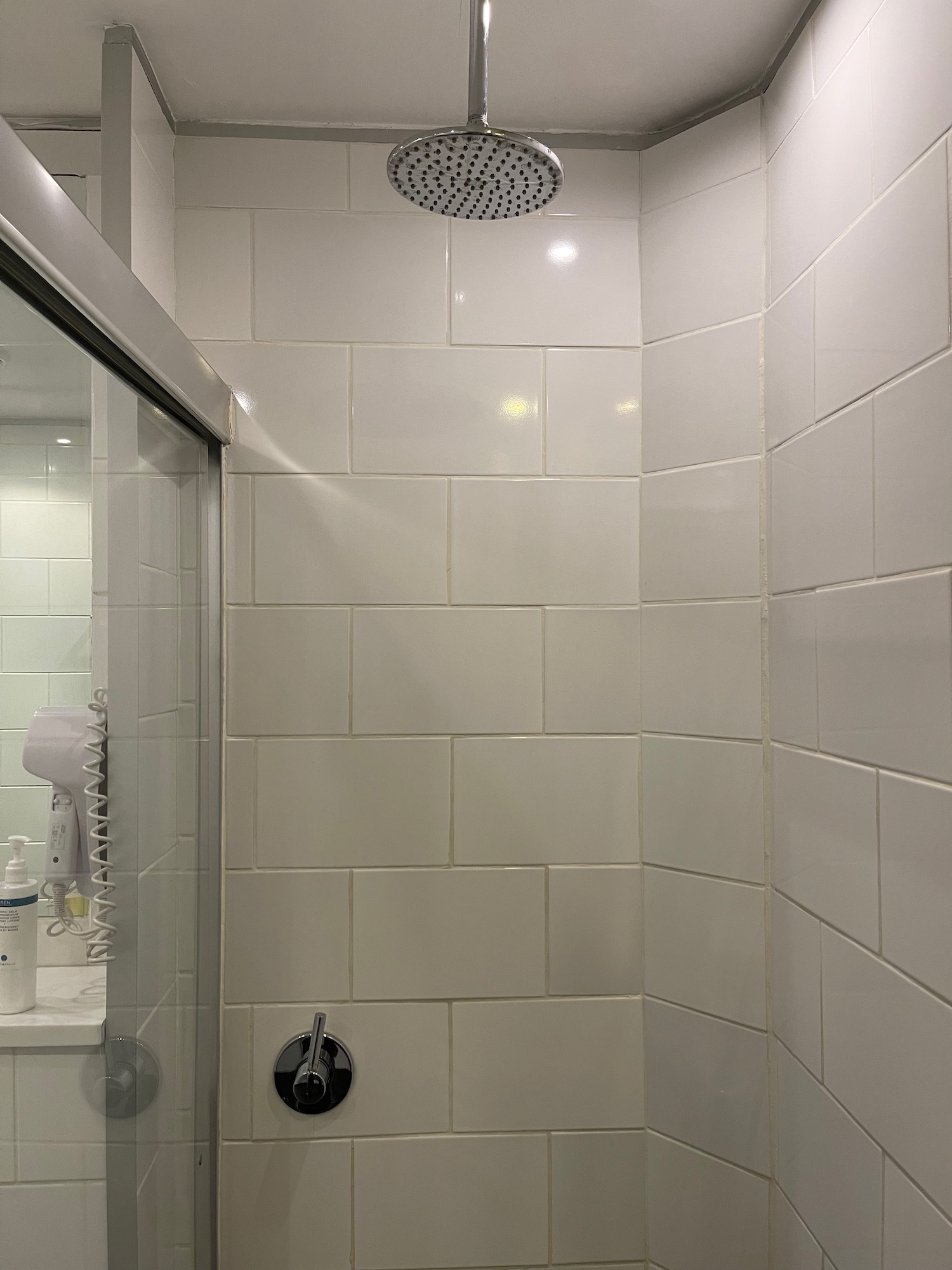 a shower head in a bathroom