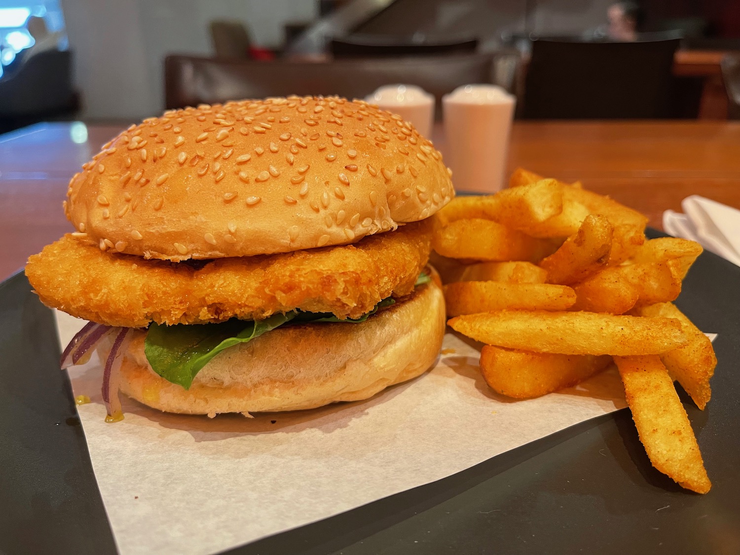 a burger and fries on a plate