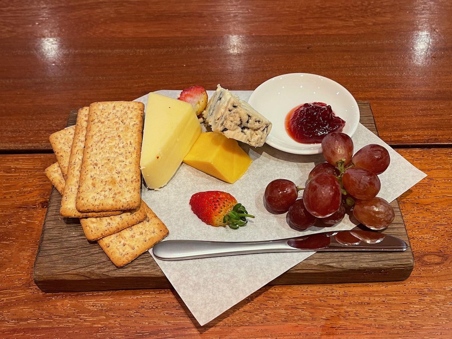 a plate of food on a wooden surface