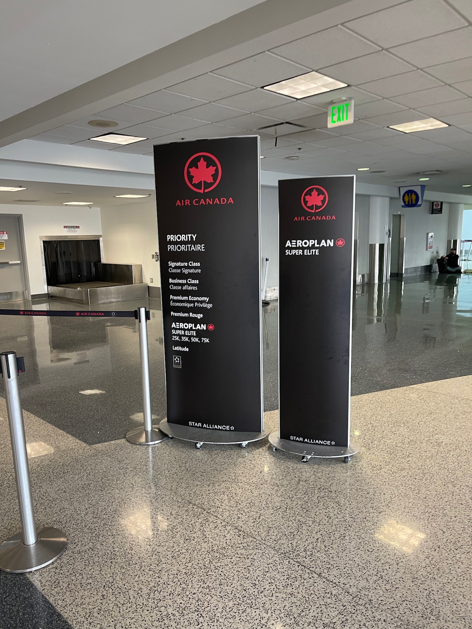 a group of black signs in a building