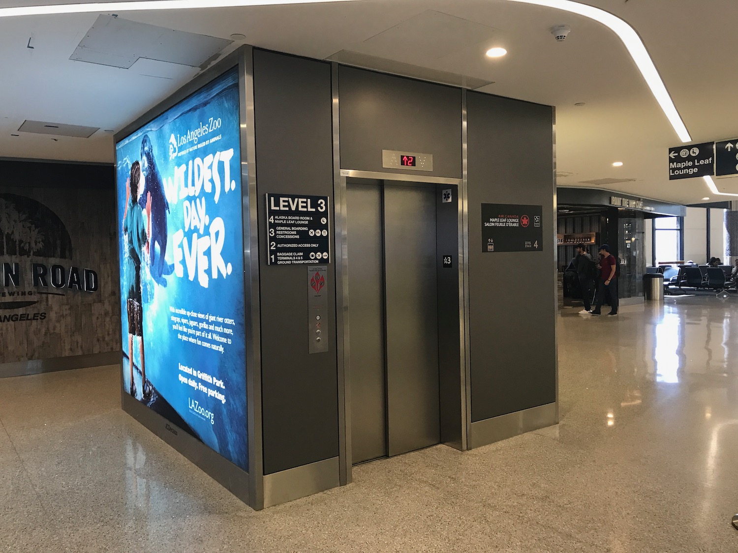 an elevator with an advertisement