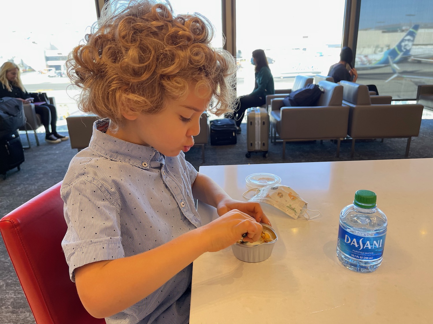 a child eating at a table