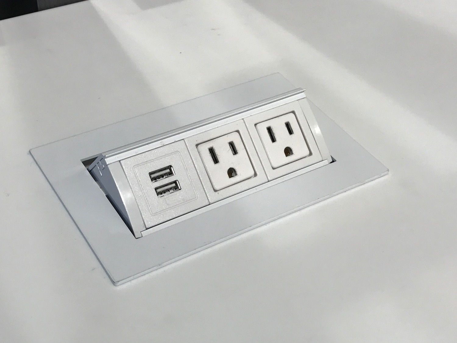 a white outlet with multiple outlets