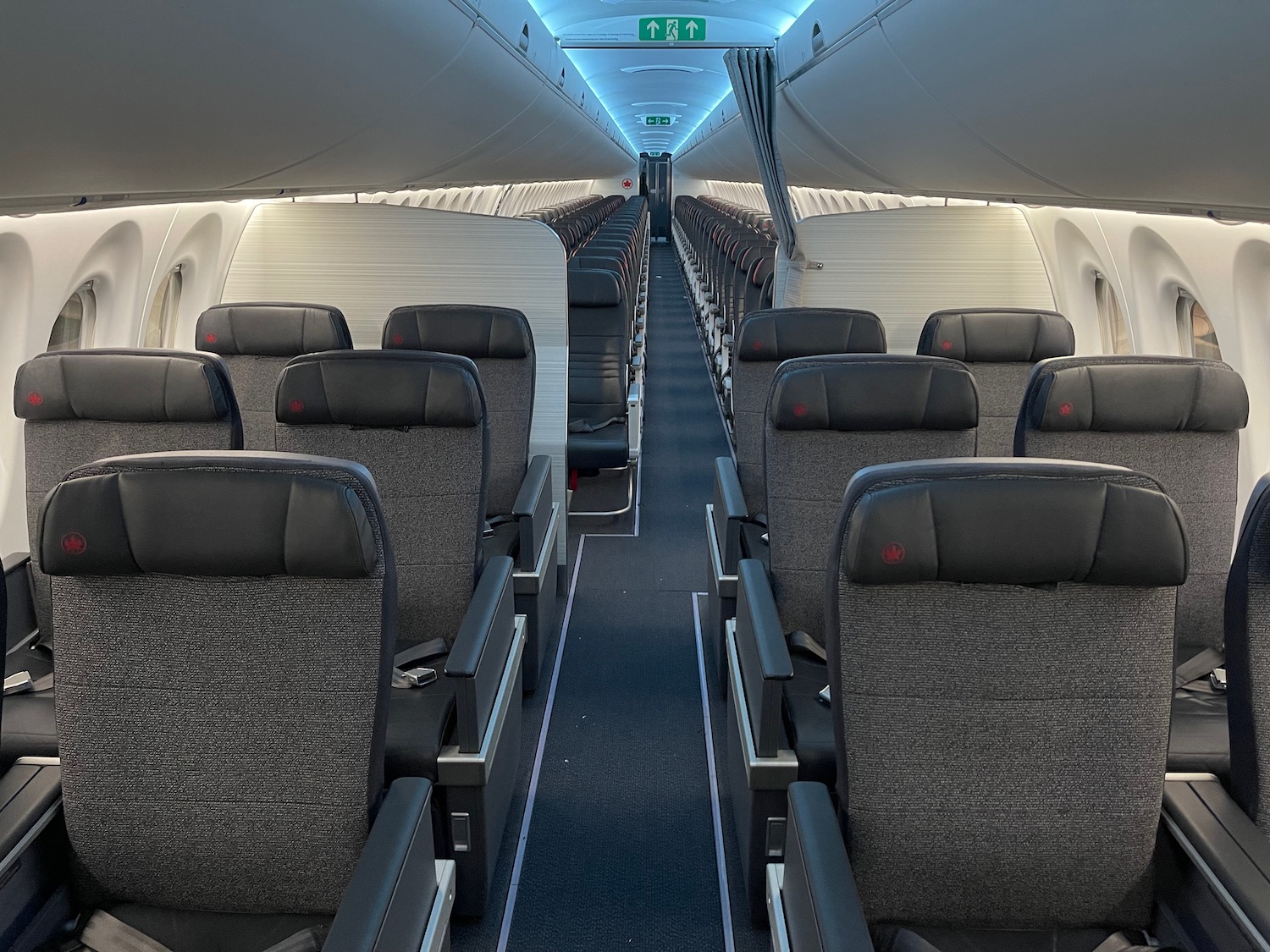 an airplane with seats and a blue light