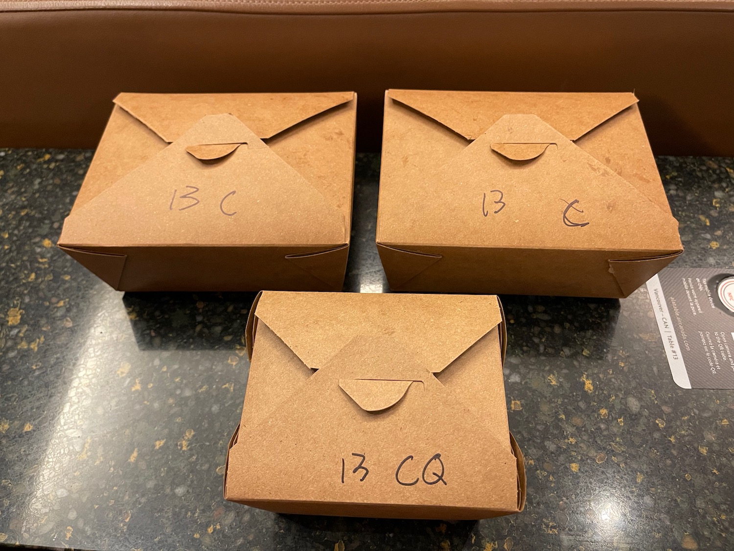 a group of brown boxes with writing on them