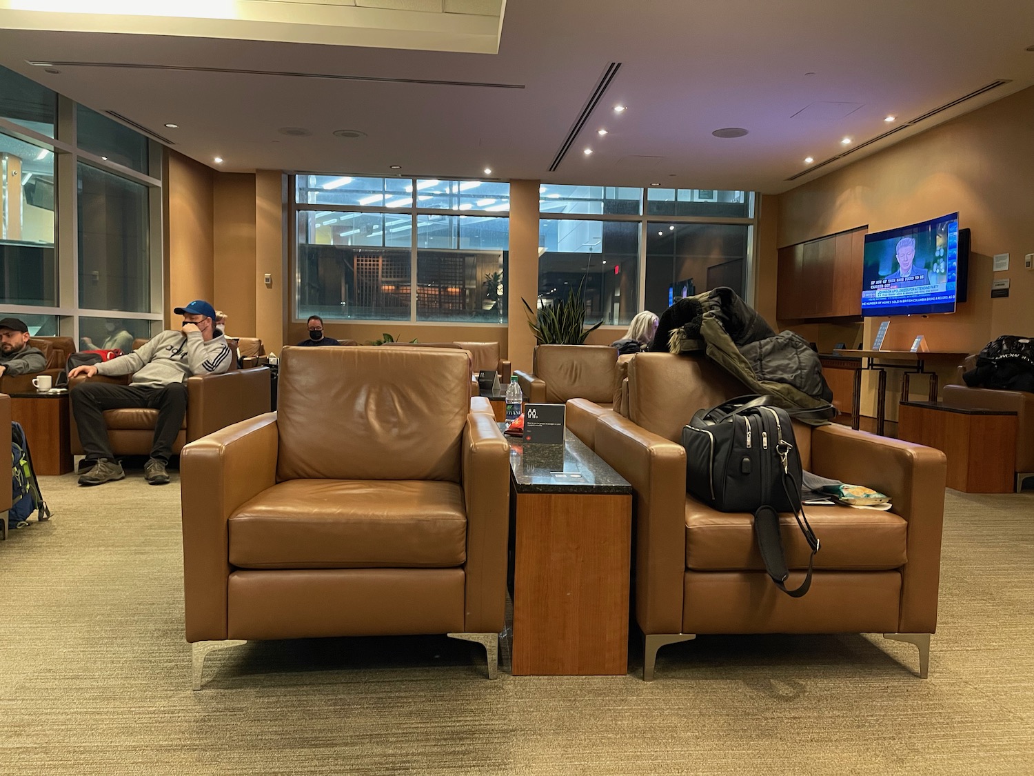 a group of people sitting in chairs in a room