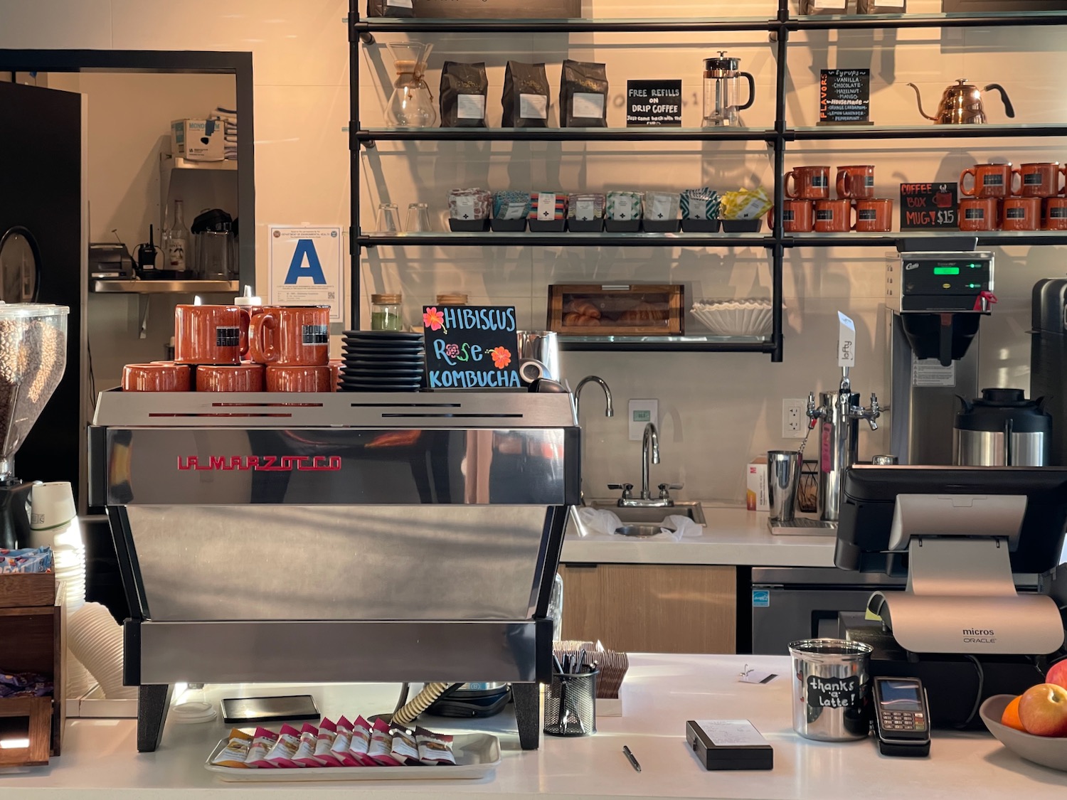 a coffee machine and coffee machine in a coffee shop