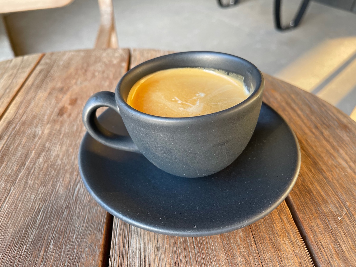 a cup of coffee on a saucer