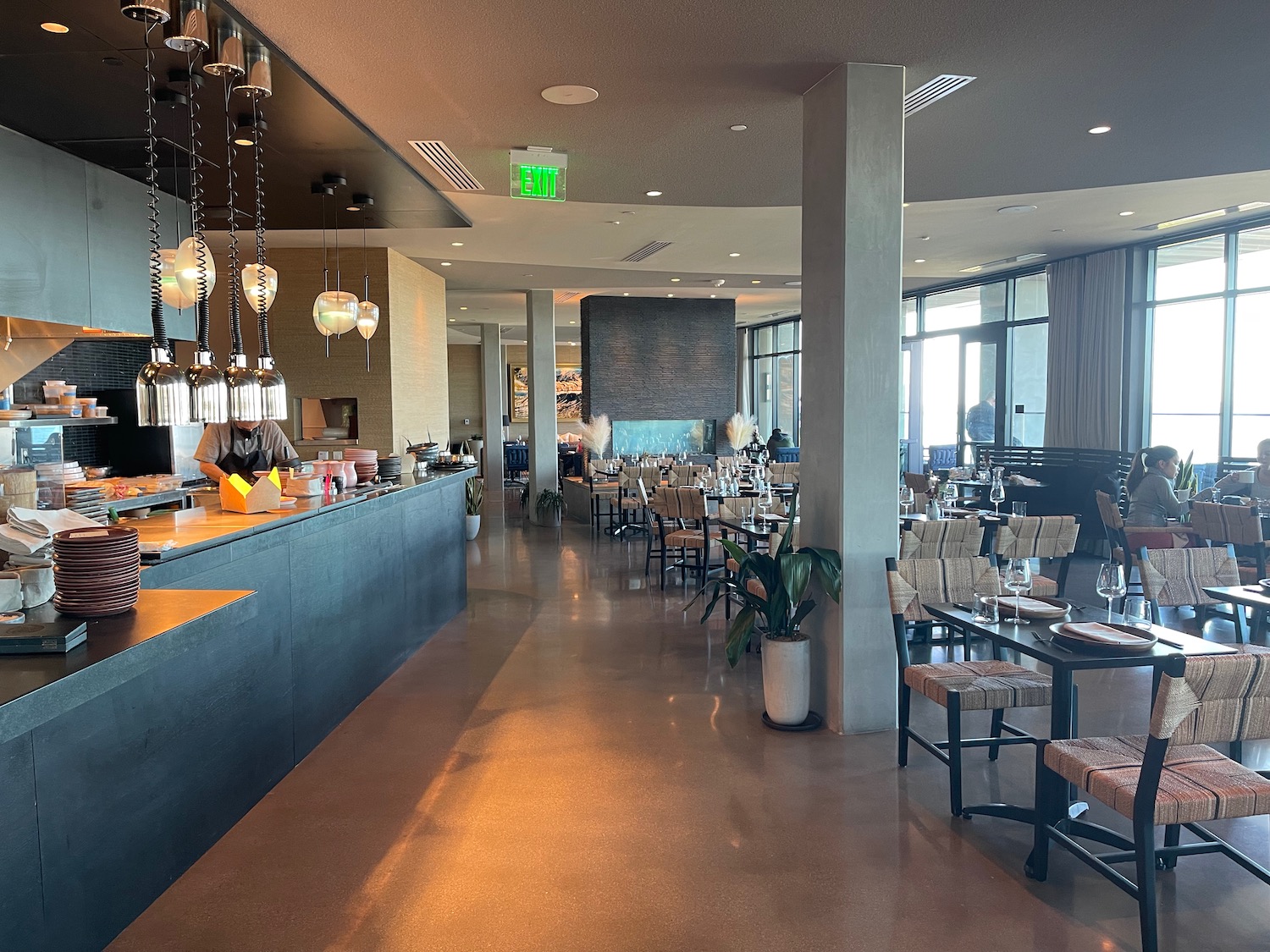 a restaurant with tables and chairs