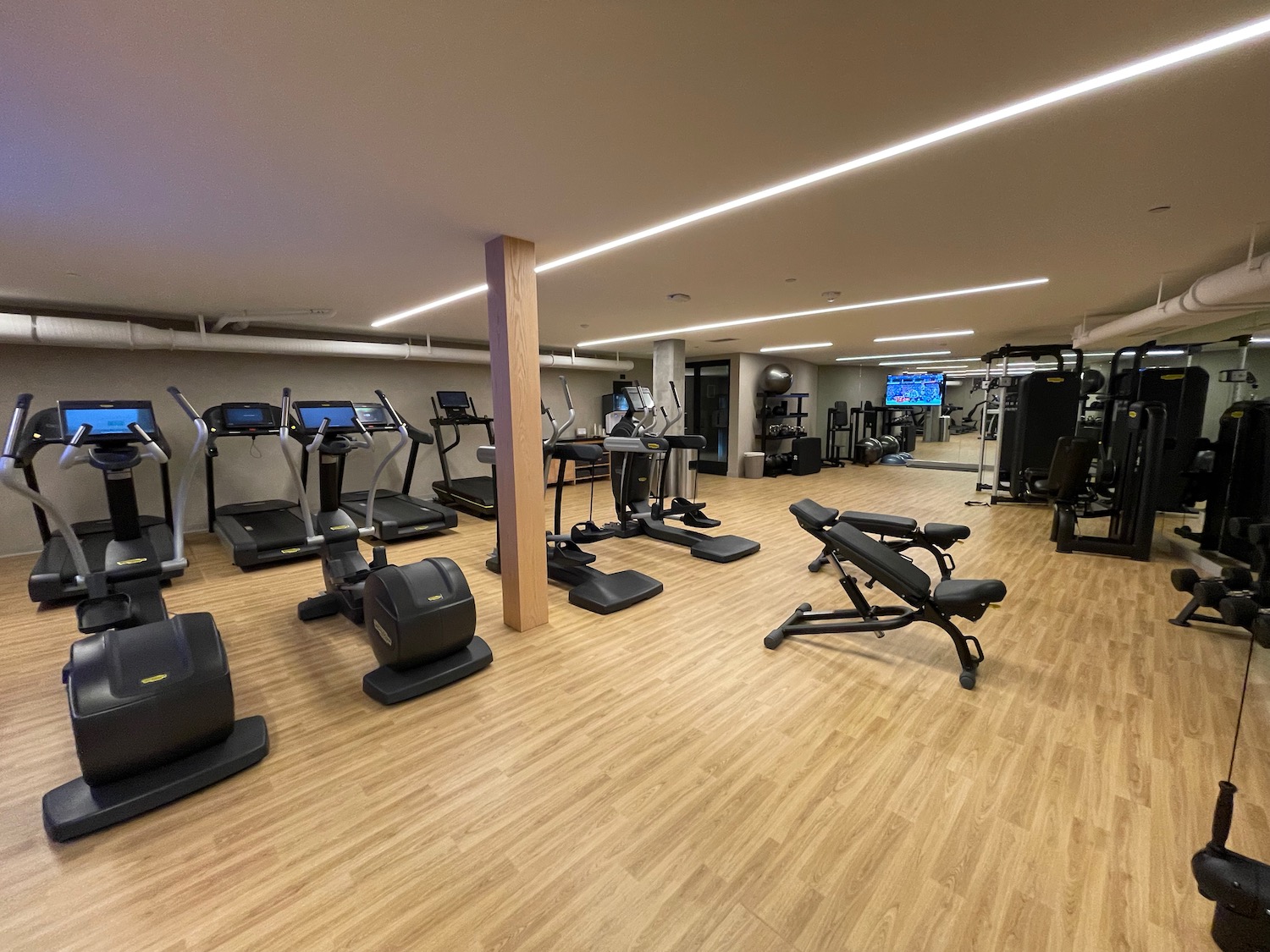 a large gym with exercise equipment