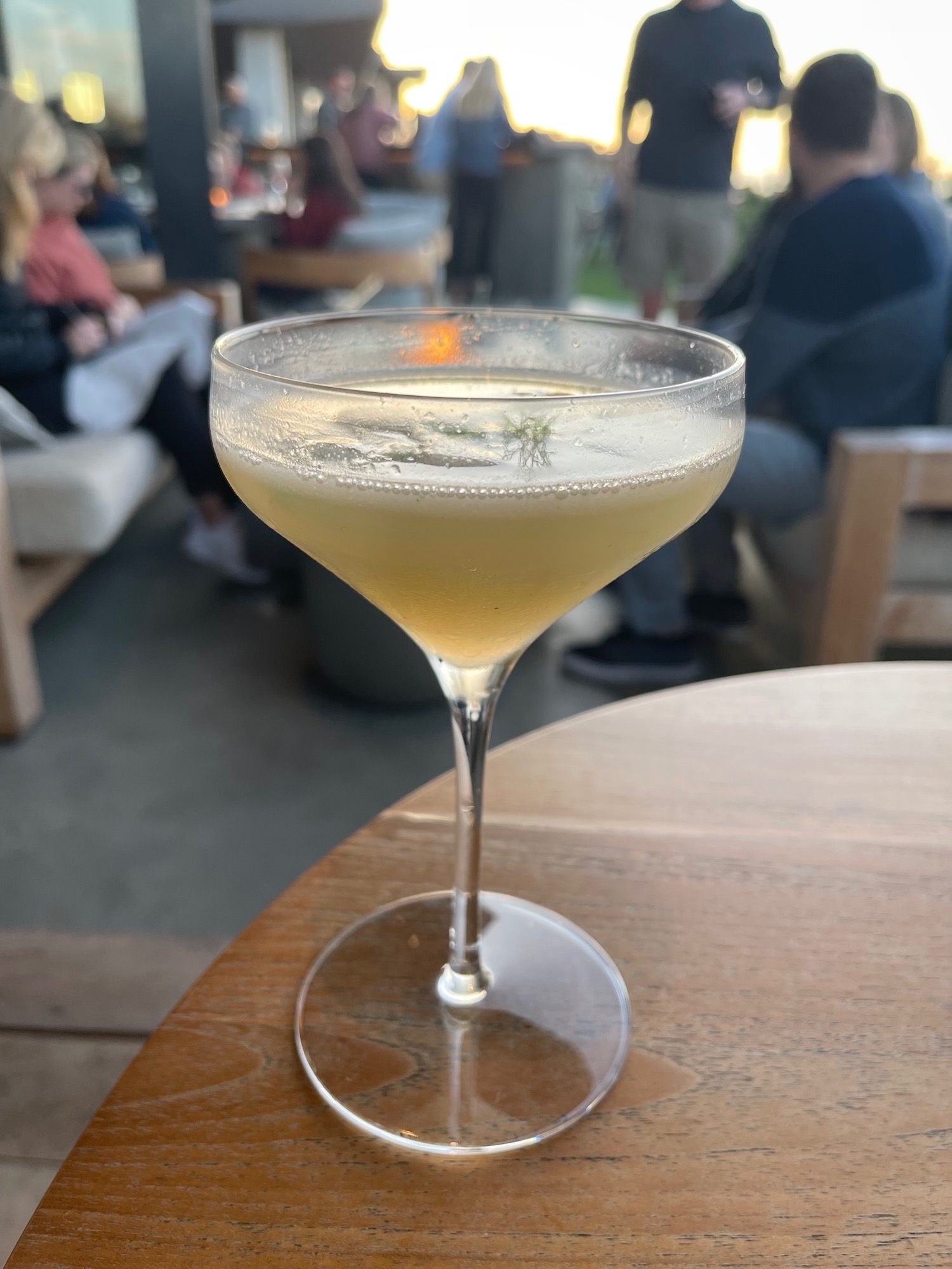 a glass of liquid on a table