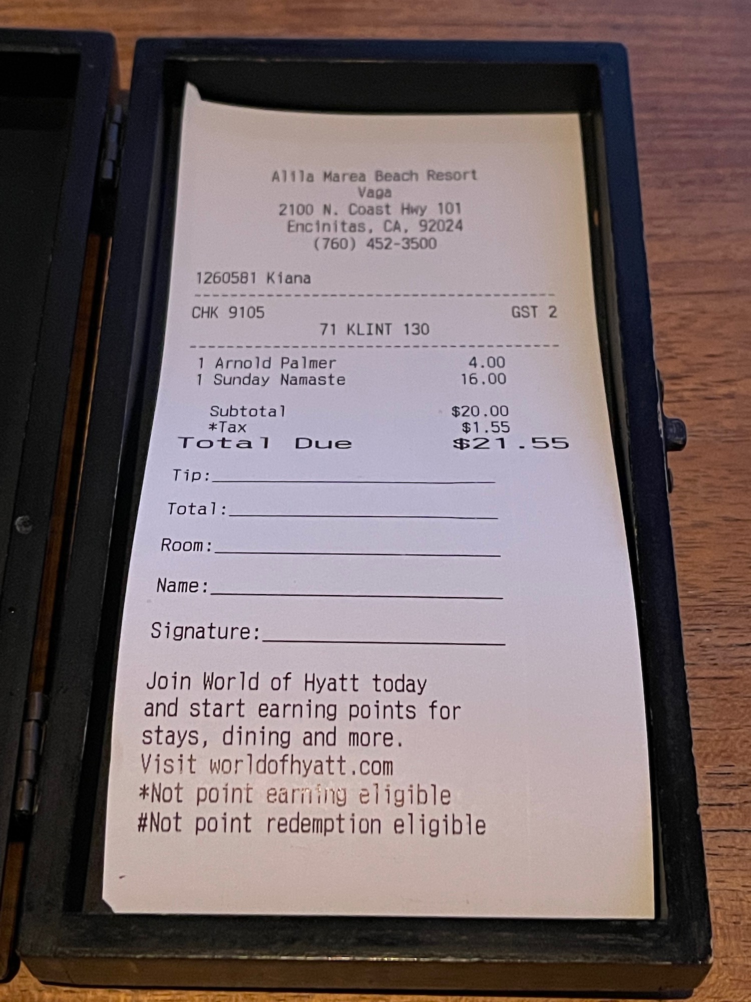 a receipt in a black case