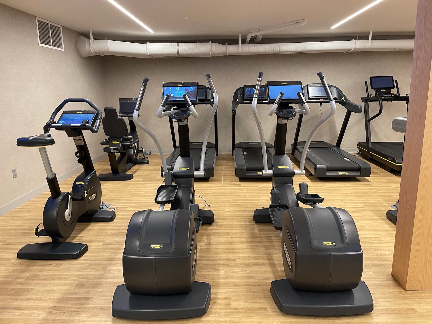 a group of treadmills in a room