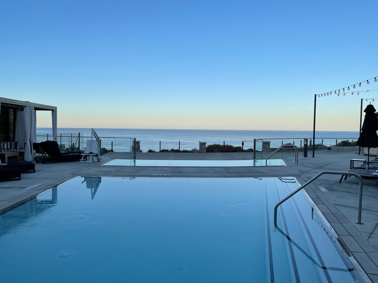 a pool with a view of the ocean