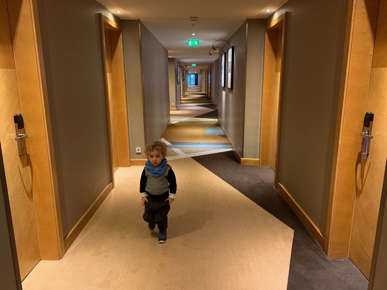 a child walking in a hallway