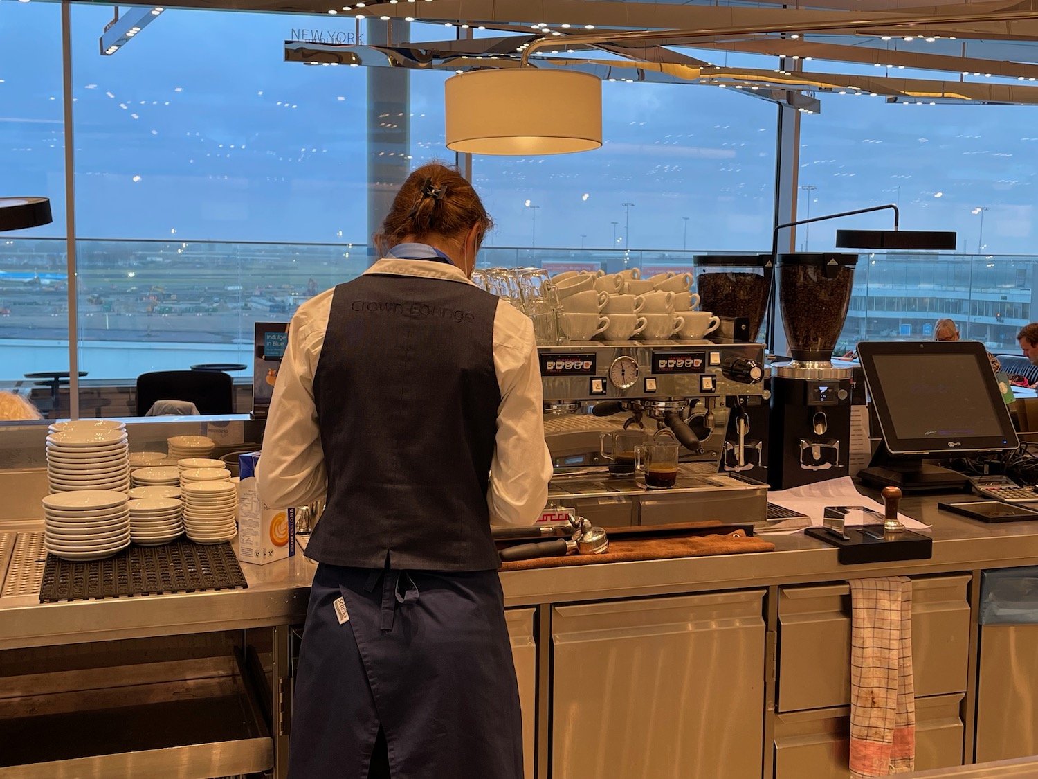 a person standing behind a counter