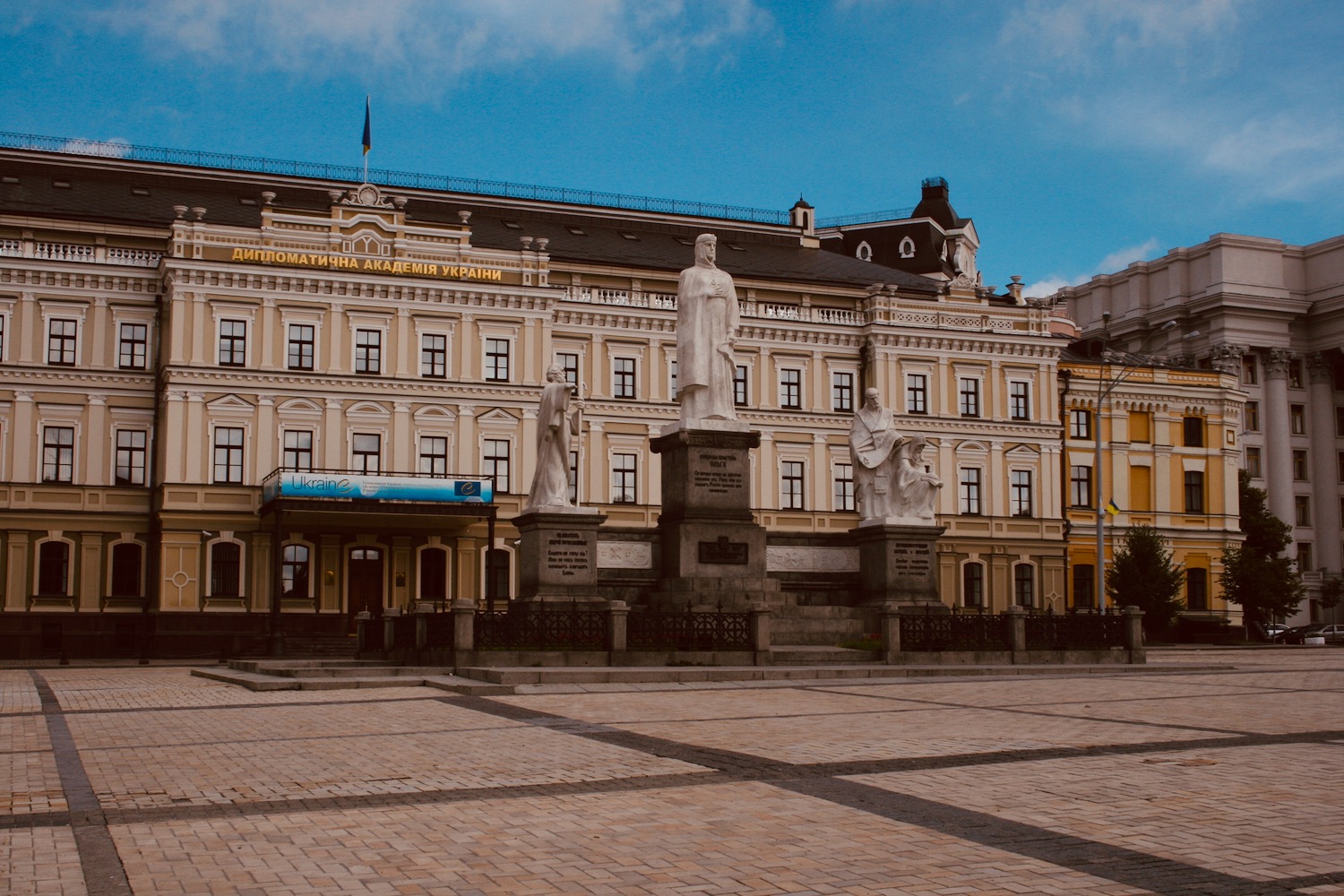 a statue in front of a building