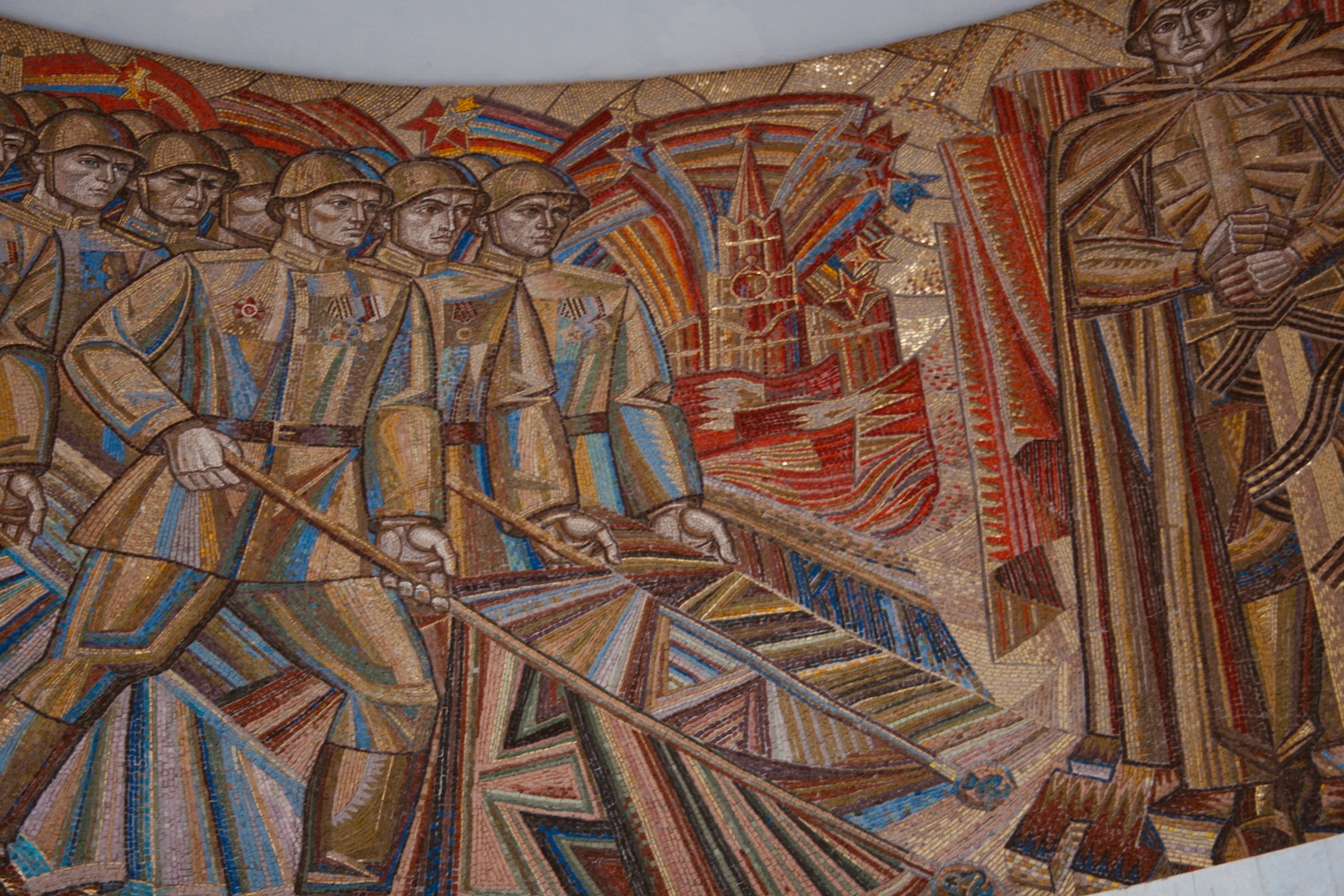 a mosaic of soldiers on a wall