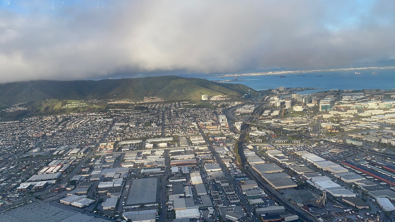 aerial view of a city and a body of water