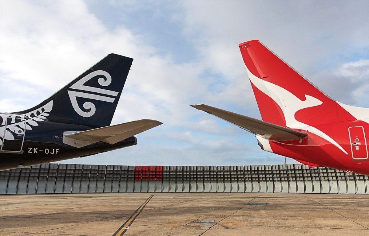 tail tails of airplanes on a runway