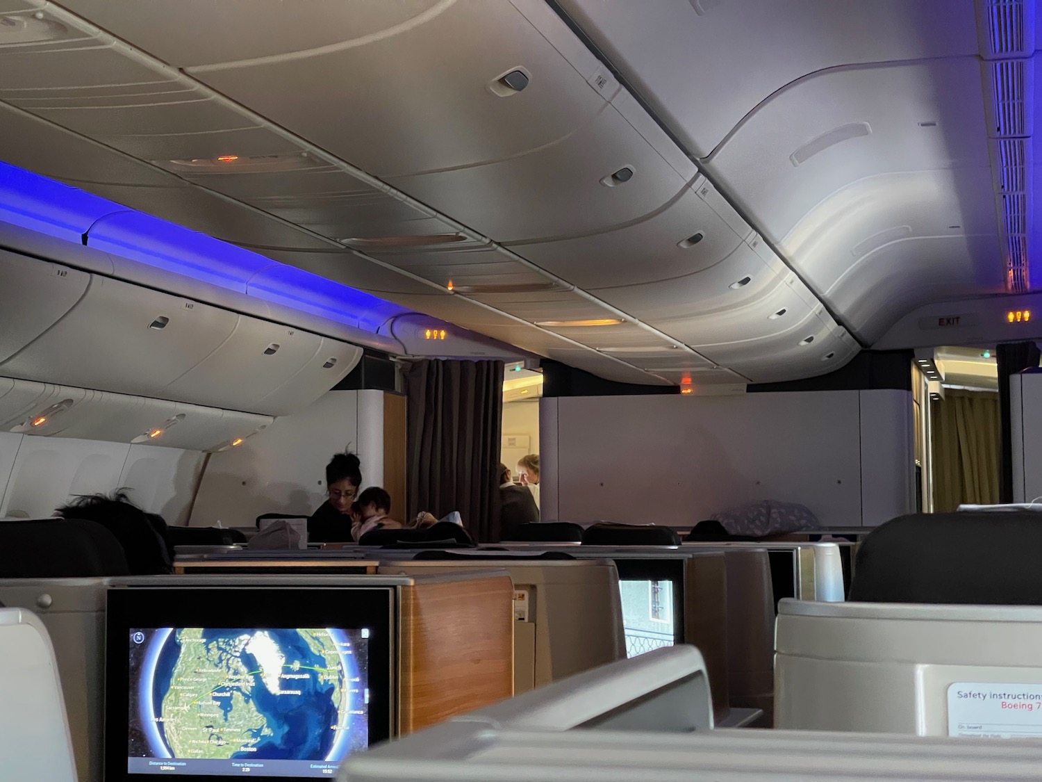 a group of people sitting in an airplane