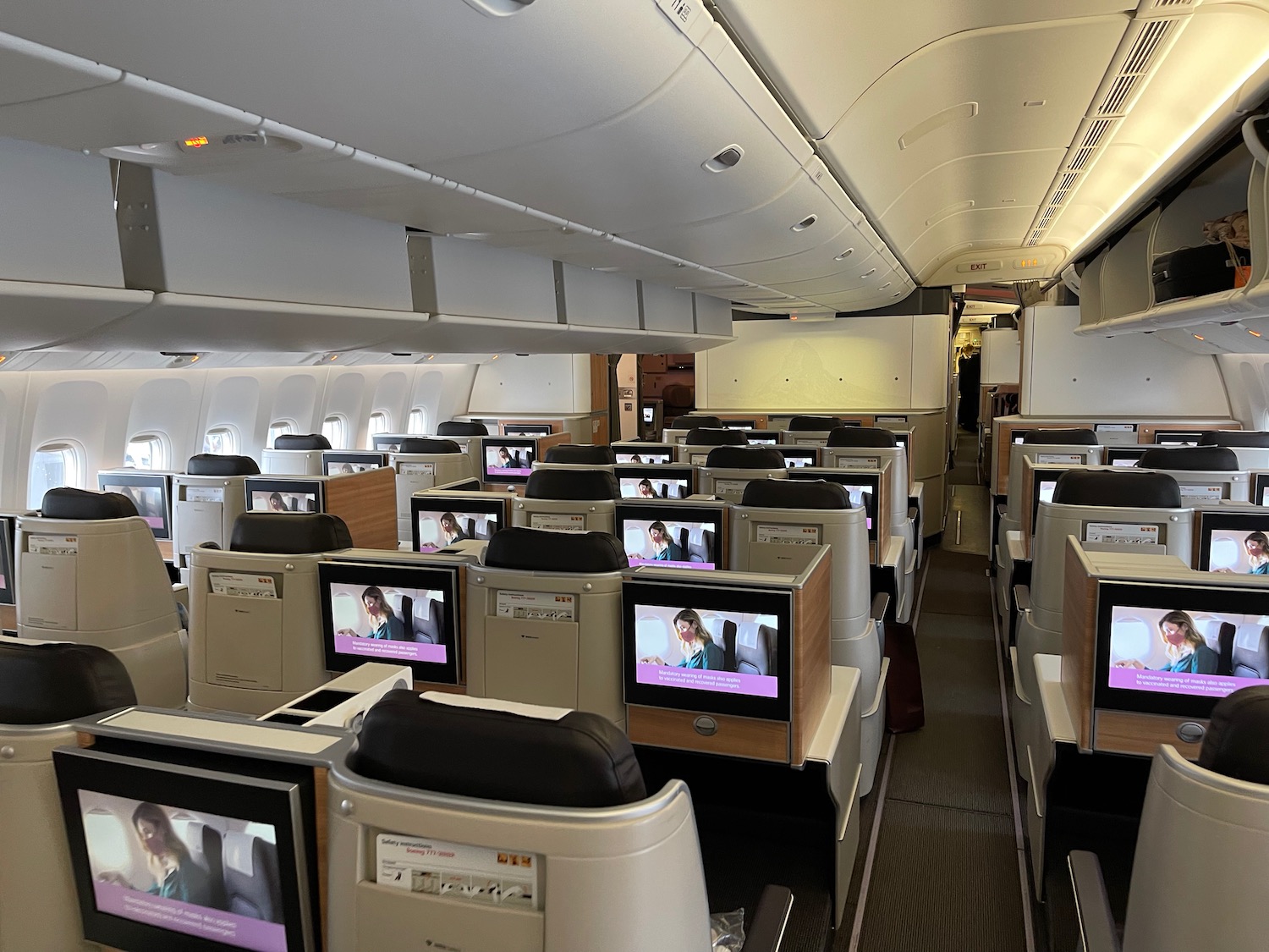 an airplane with rows of monitors