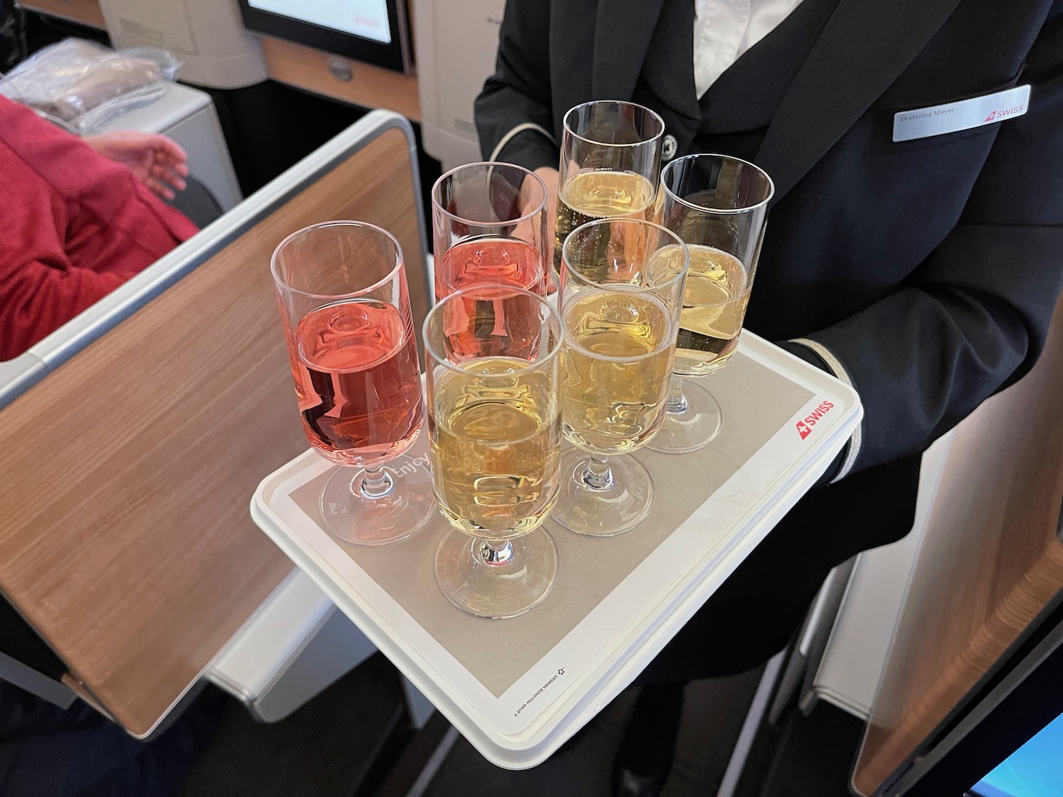 a tray of wine glasses