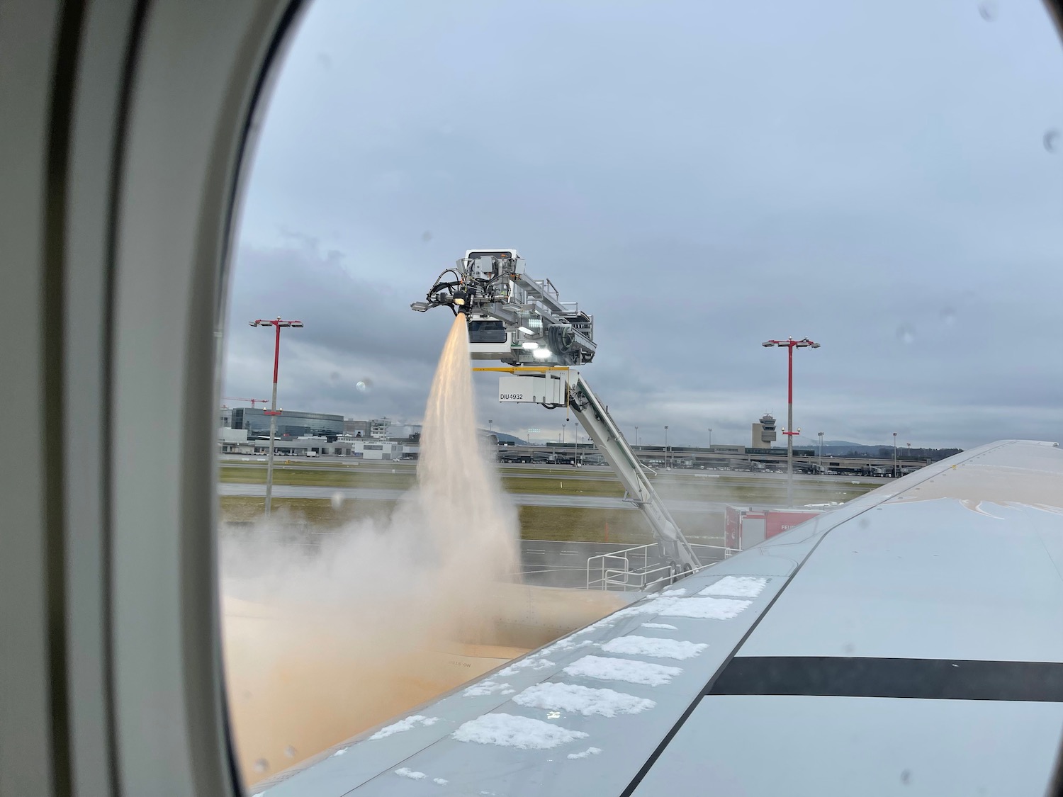 a machine spraying water from a plane