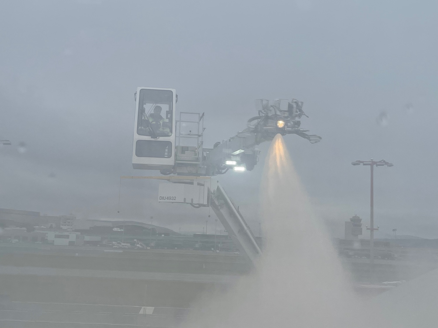 a machine spraying water on a bridge