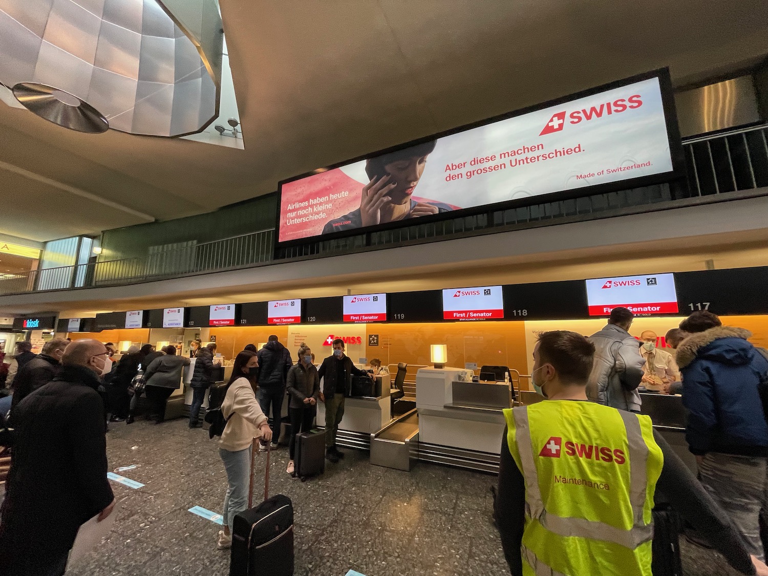 a group of people in an airport