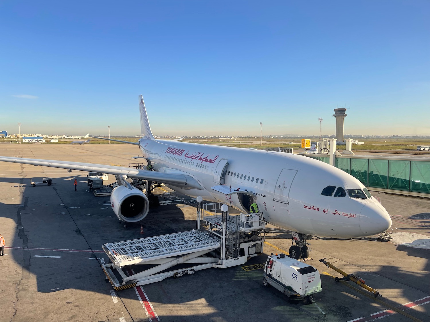 a white airplane on a tarmac