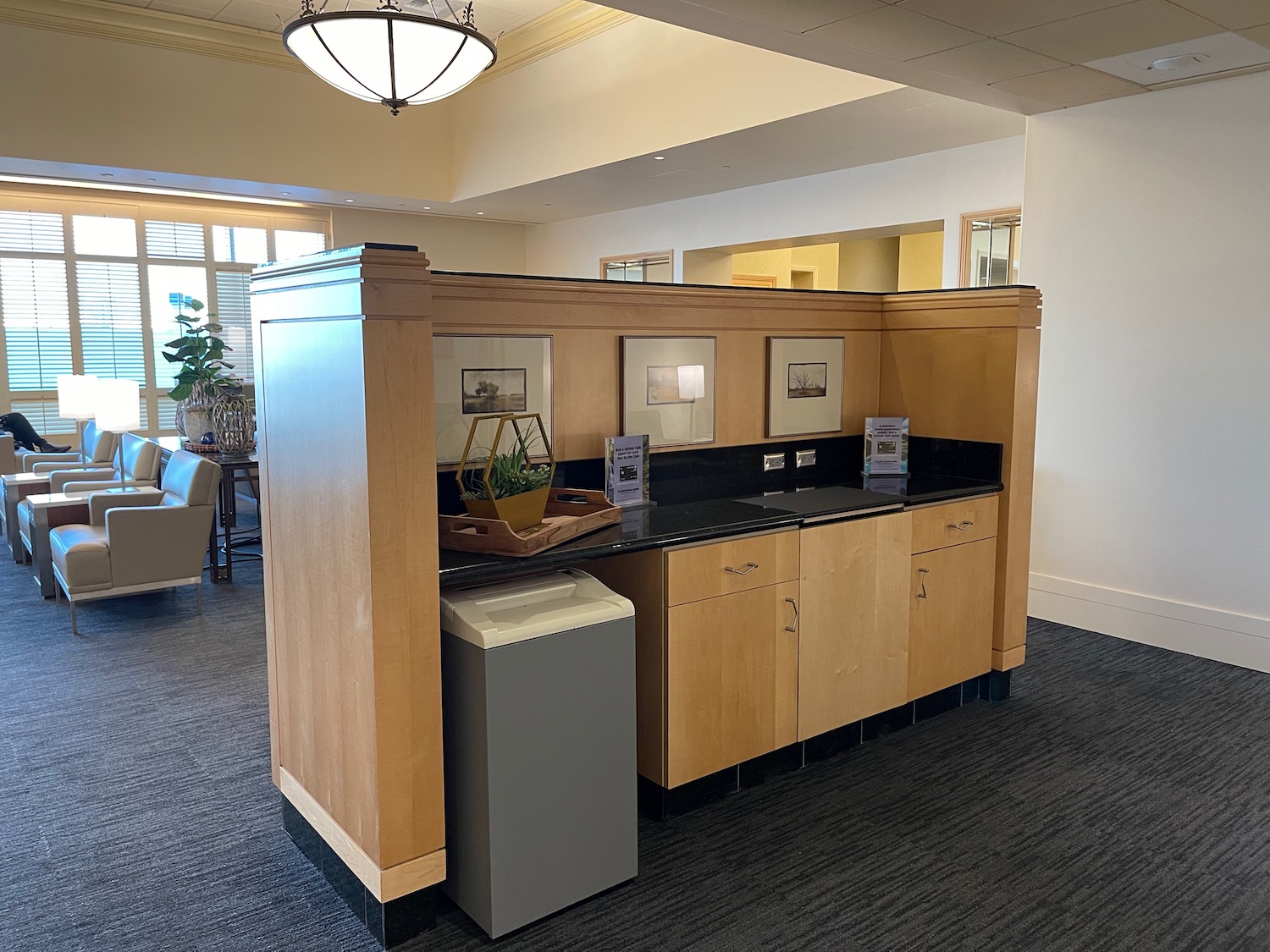 a room with a counter and a refrigerator