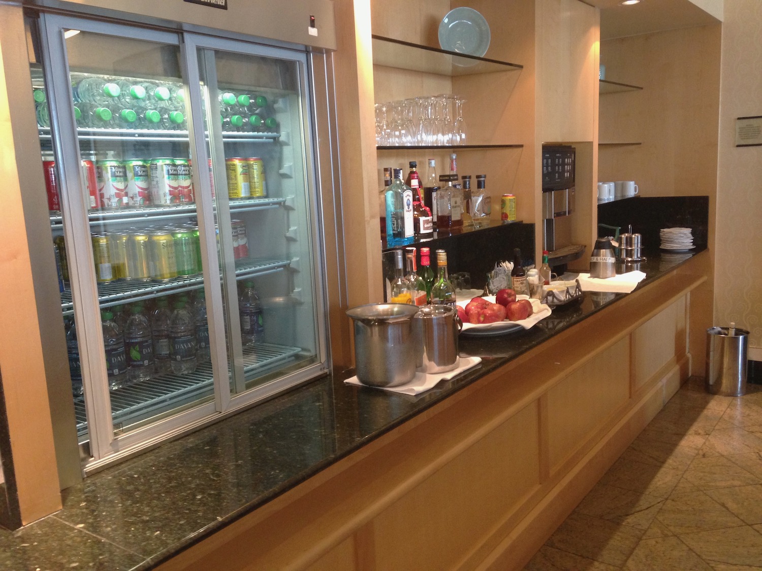 a refrigerated fridge with drinks and beverages