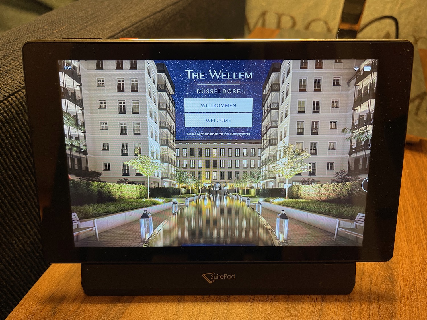 a screen with a picture of a building on it