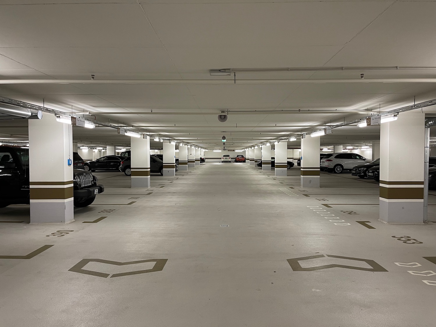 a parking garage with many cars