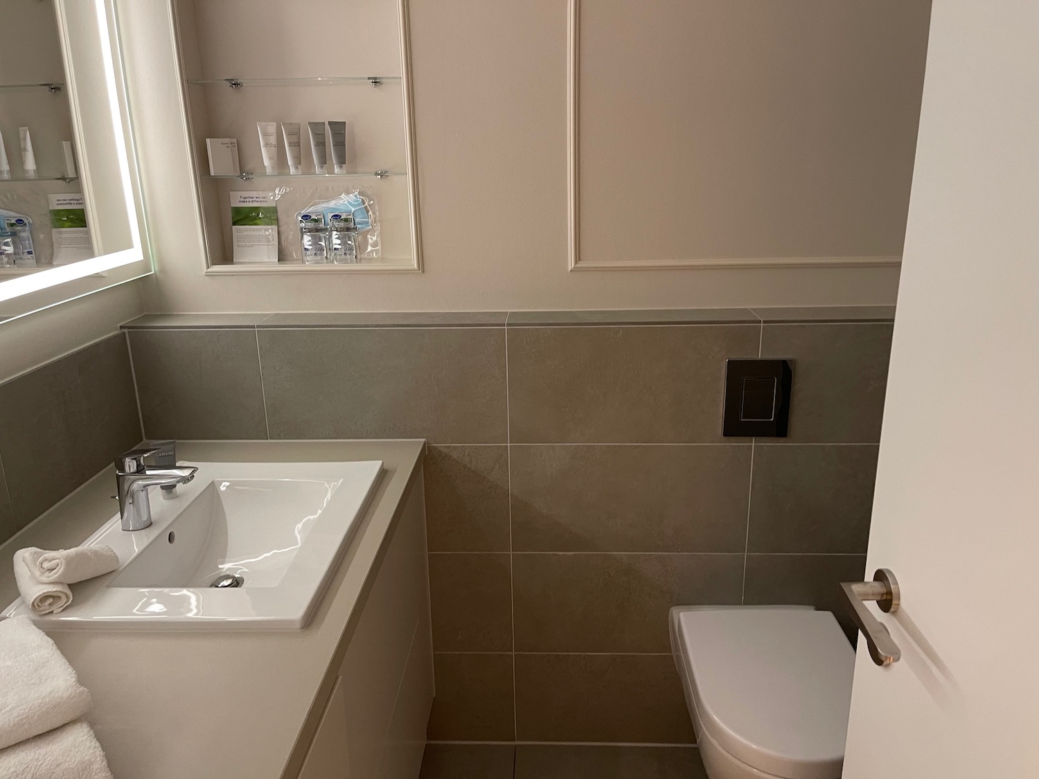 a bathroom with a sink and toilet