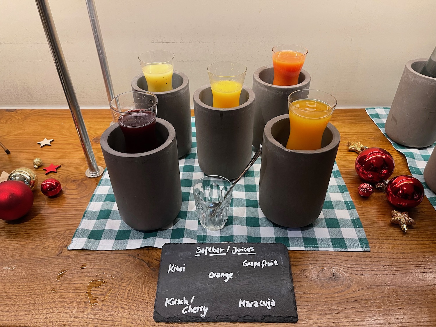 a group of glasses with different drinks in them