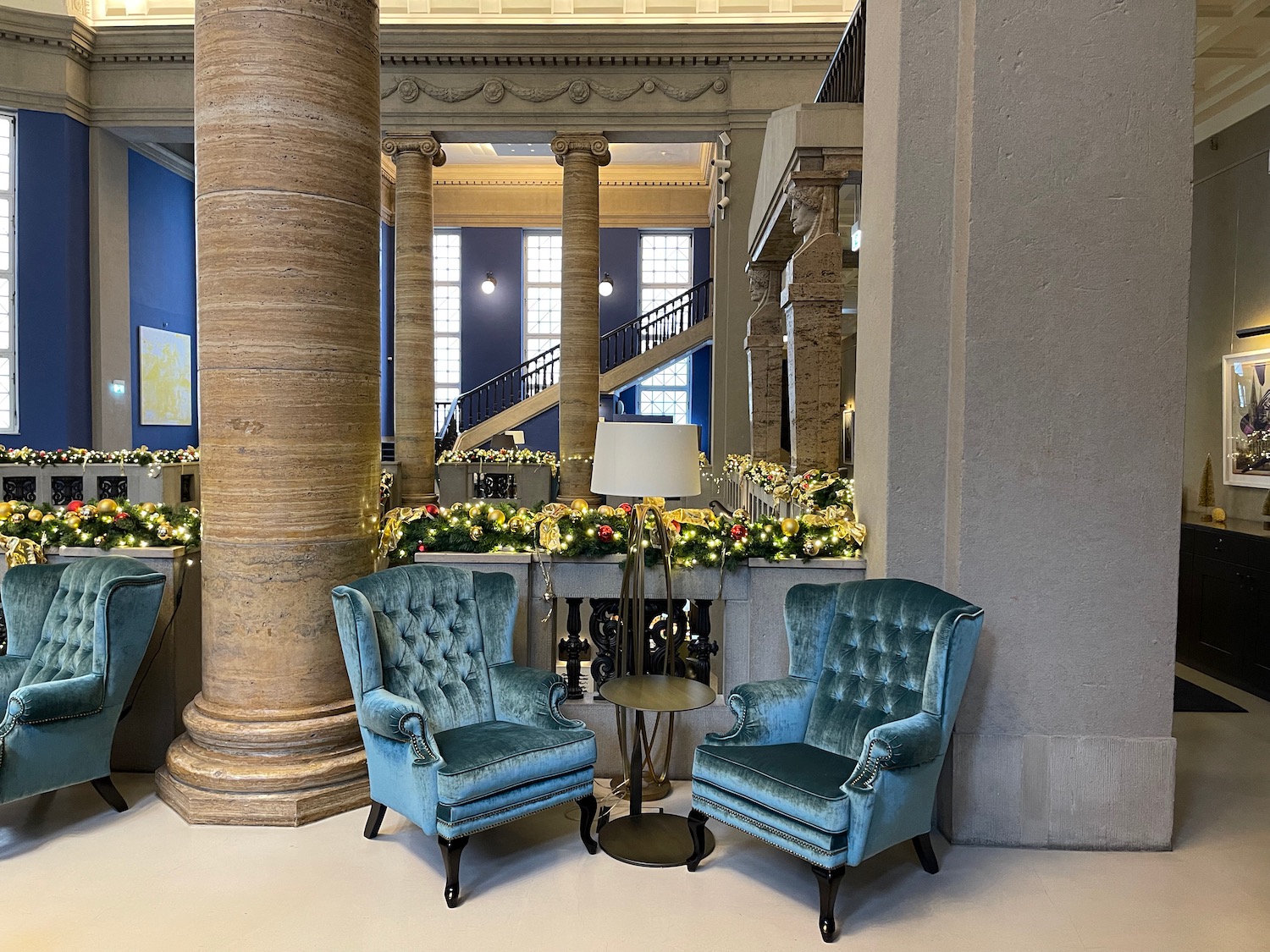 two blue chairs in a room