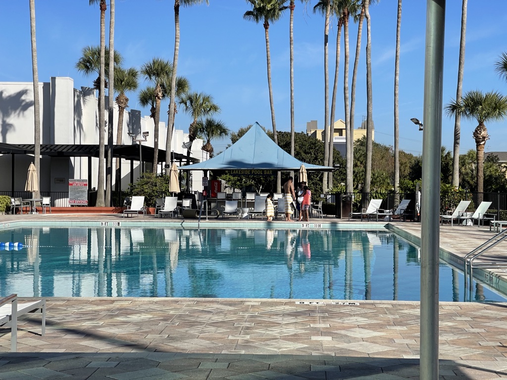doubletree orlando at the entrance of universal studios pool and seating