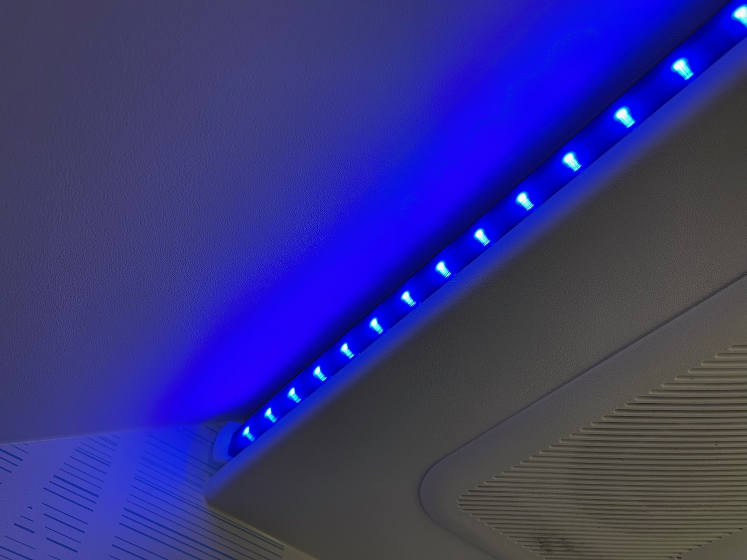 a blue lights on a ceiling