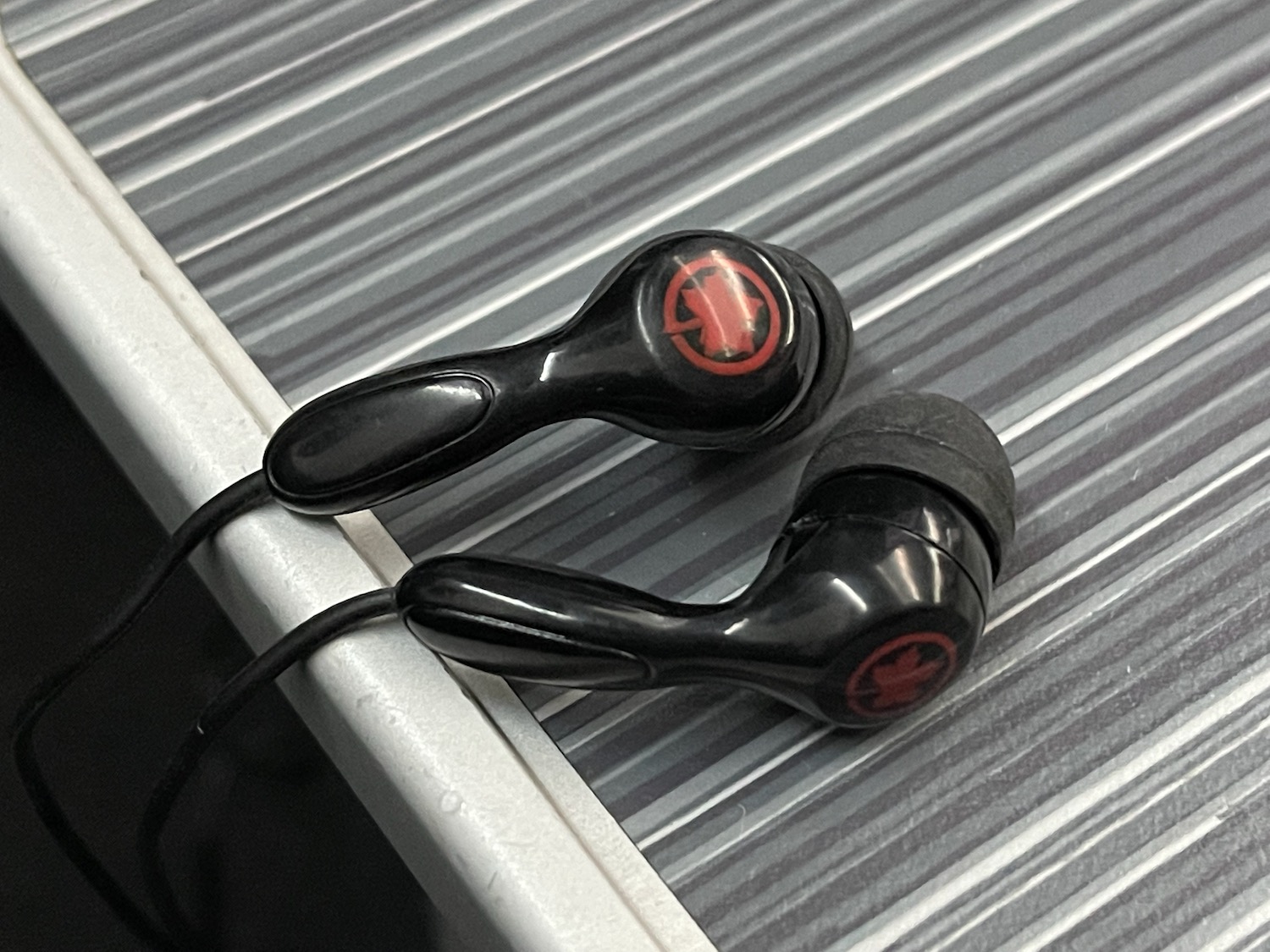 a pair of black earbuds