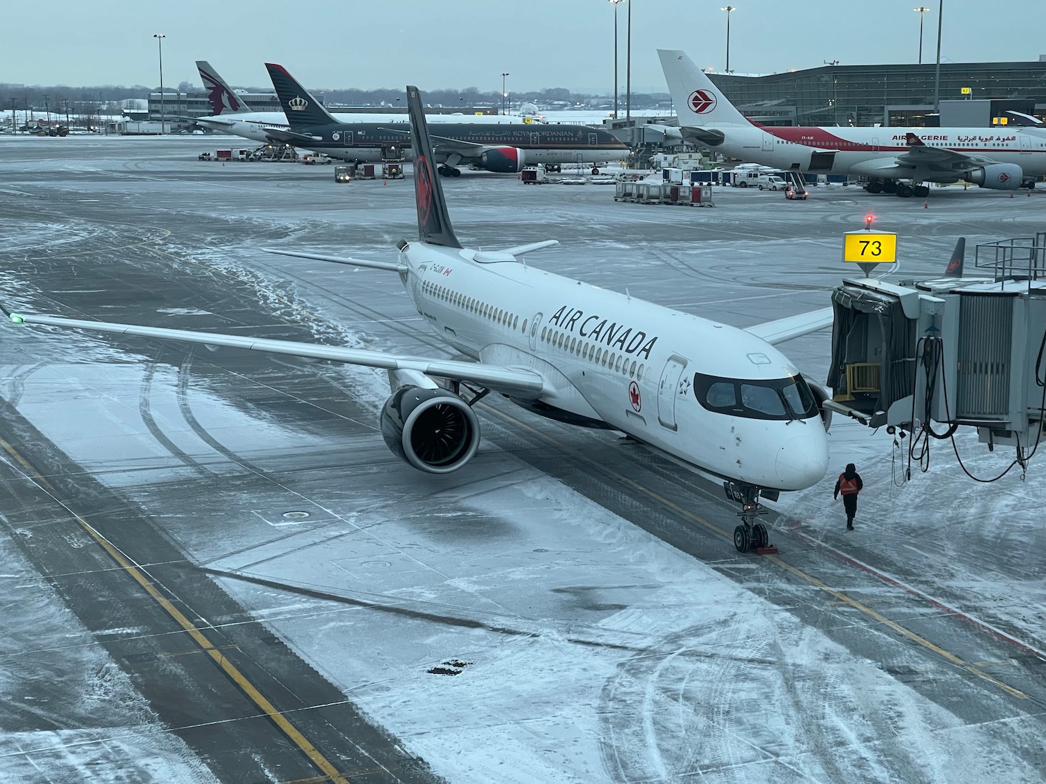 a group of airplanes on a runway