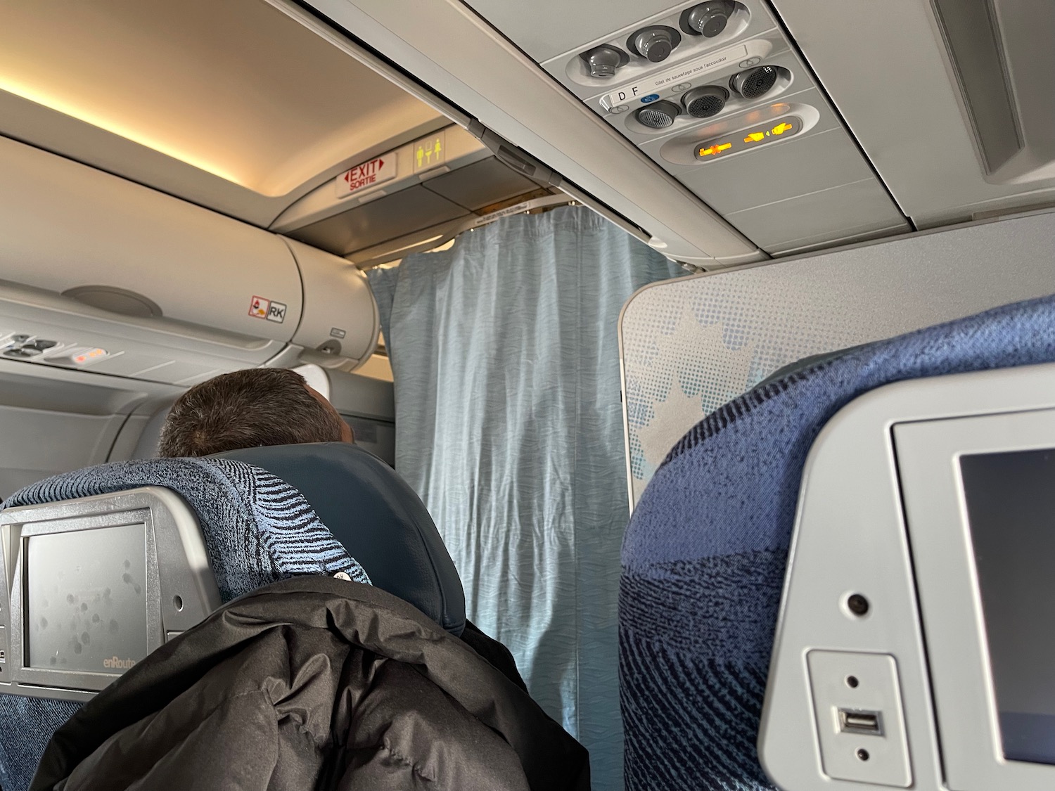 a person sitting in a plane