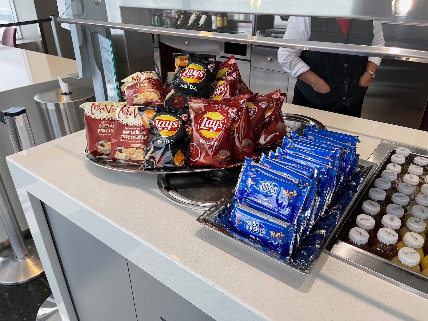 a tray of chips and snacks on a counter