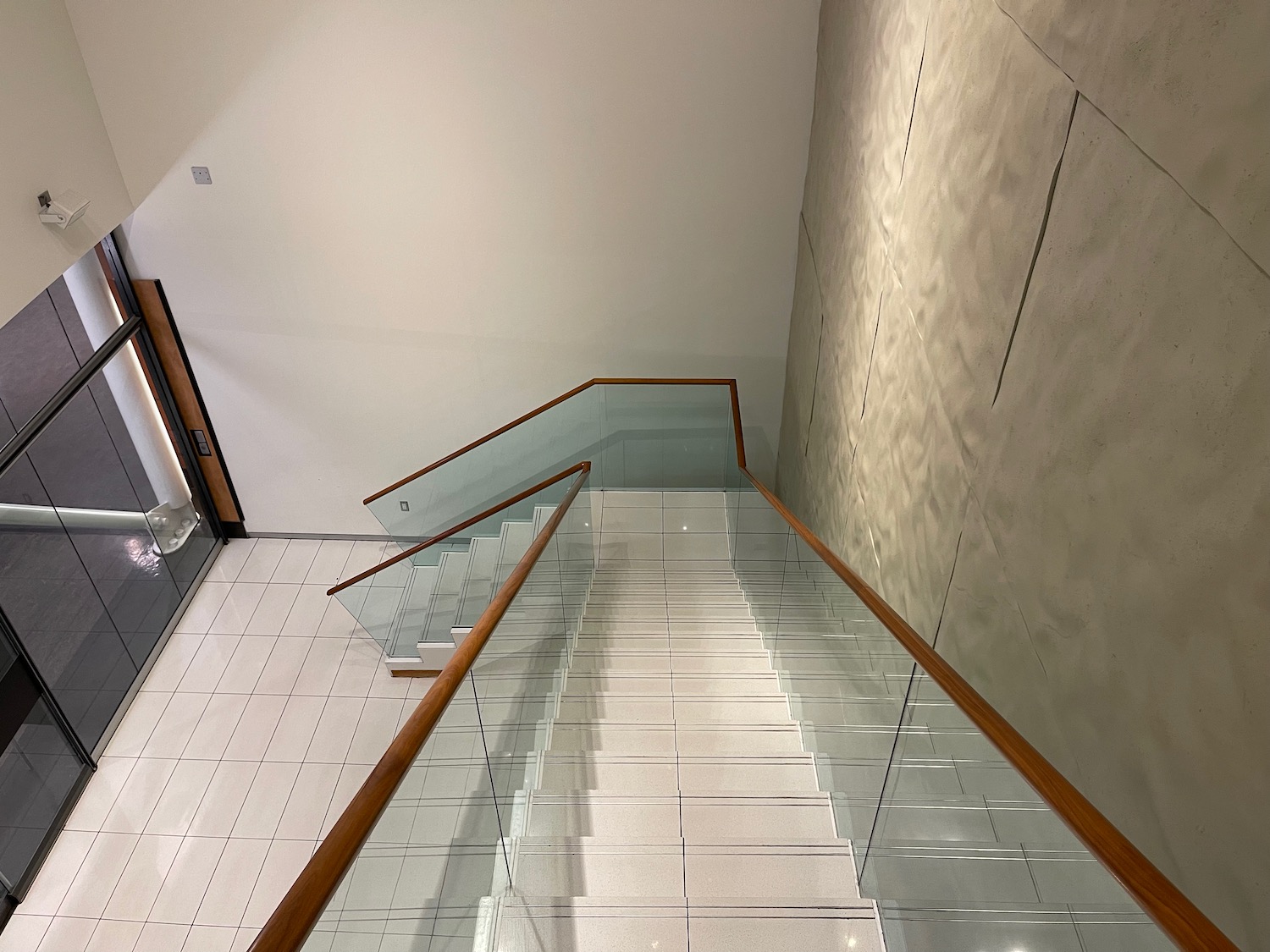 a glass staircase in a room