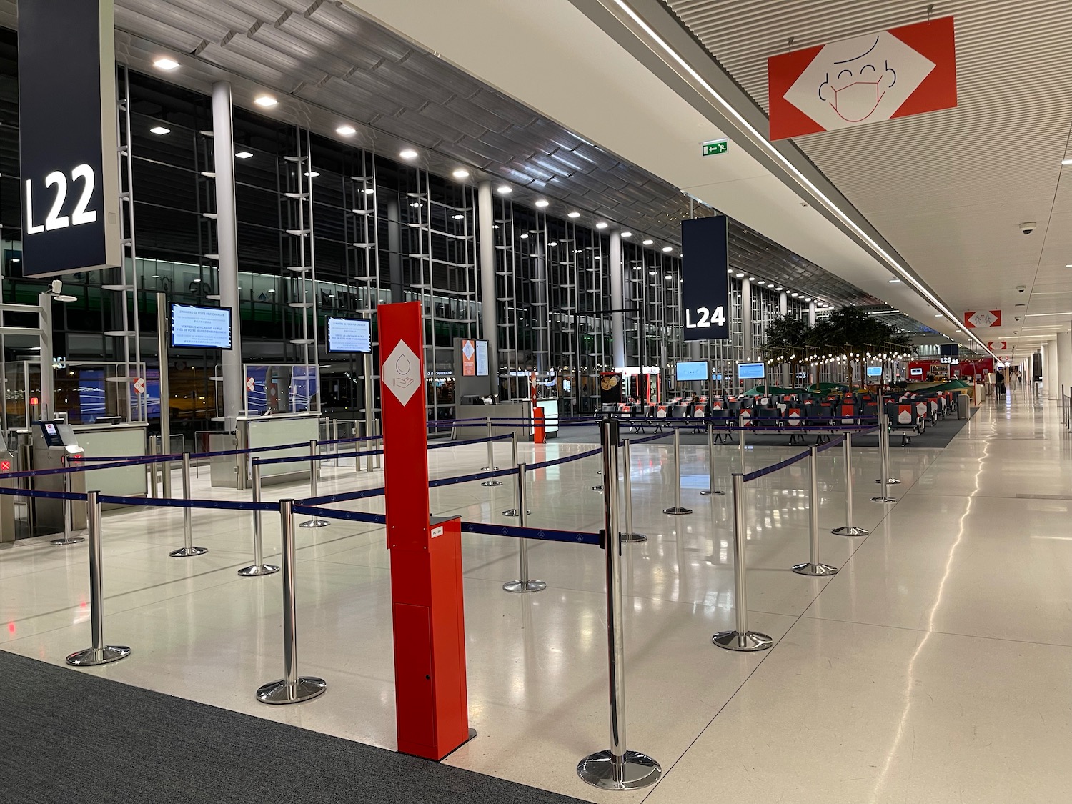 a airport with a row of barriers