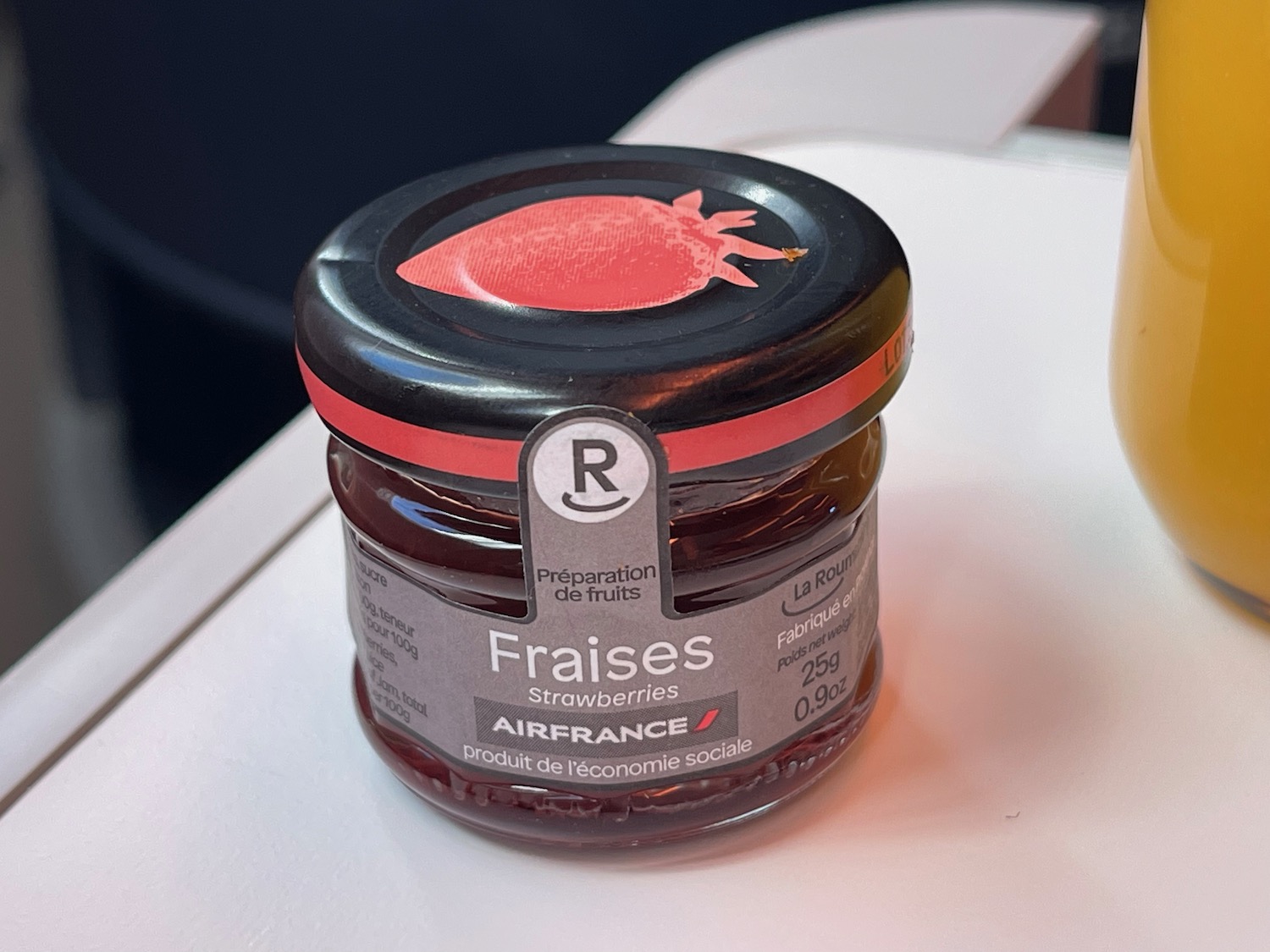 a jar of jam on a table