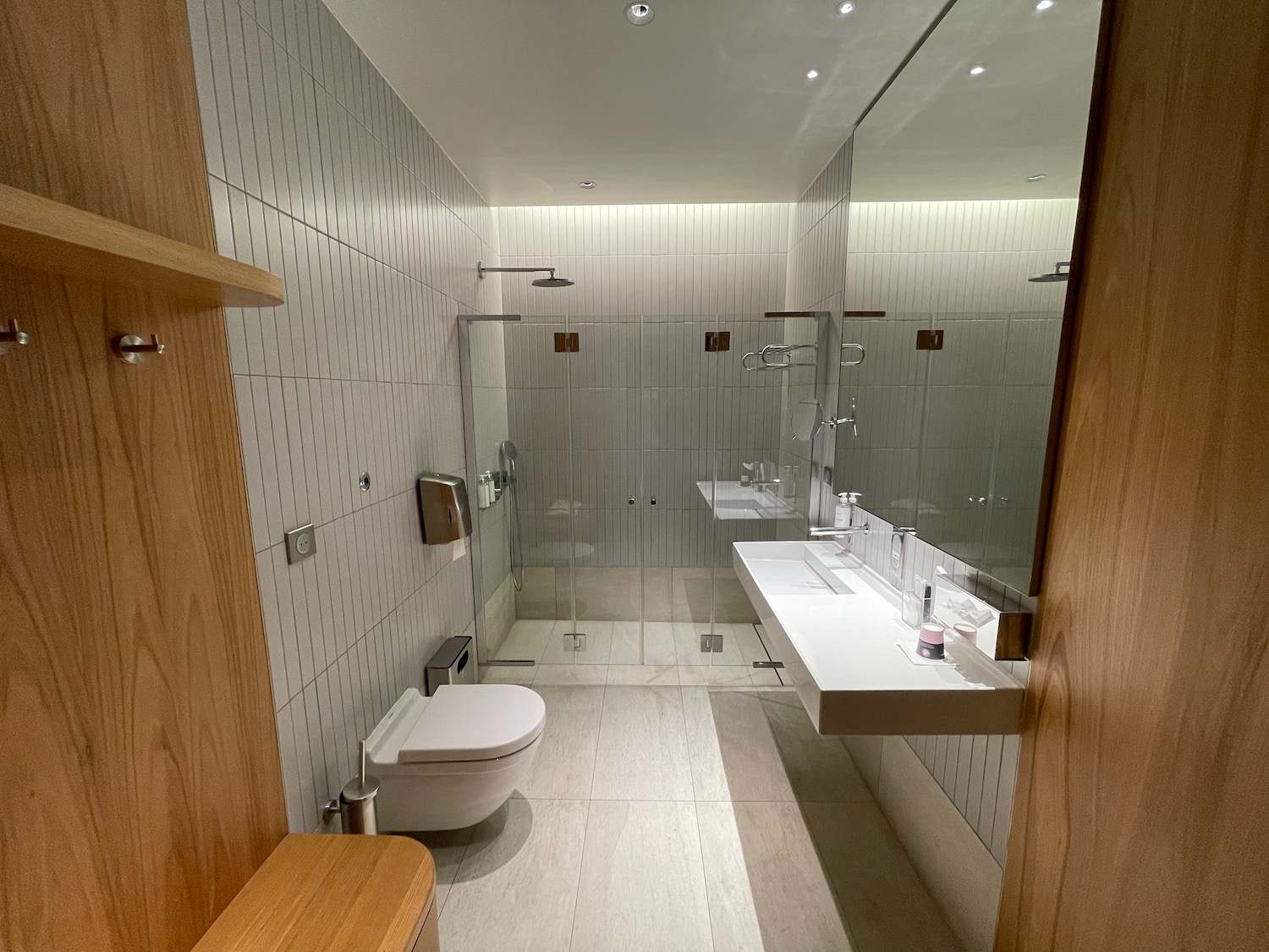 a bathroom with a shower and toilet