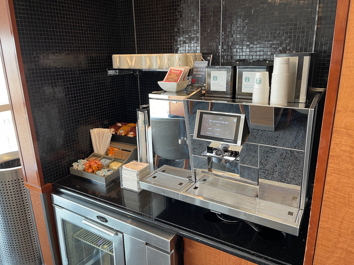 a coffee machine and food on a counter