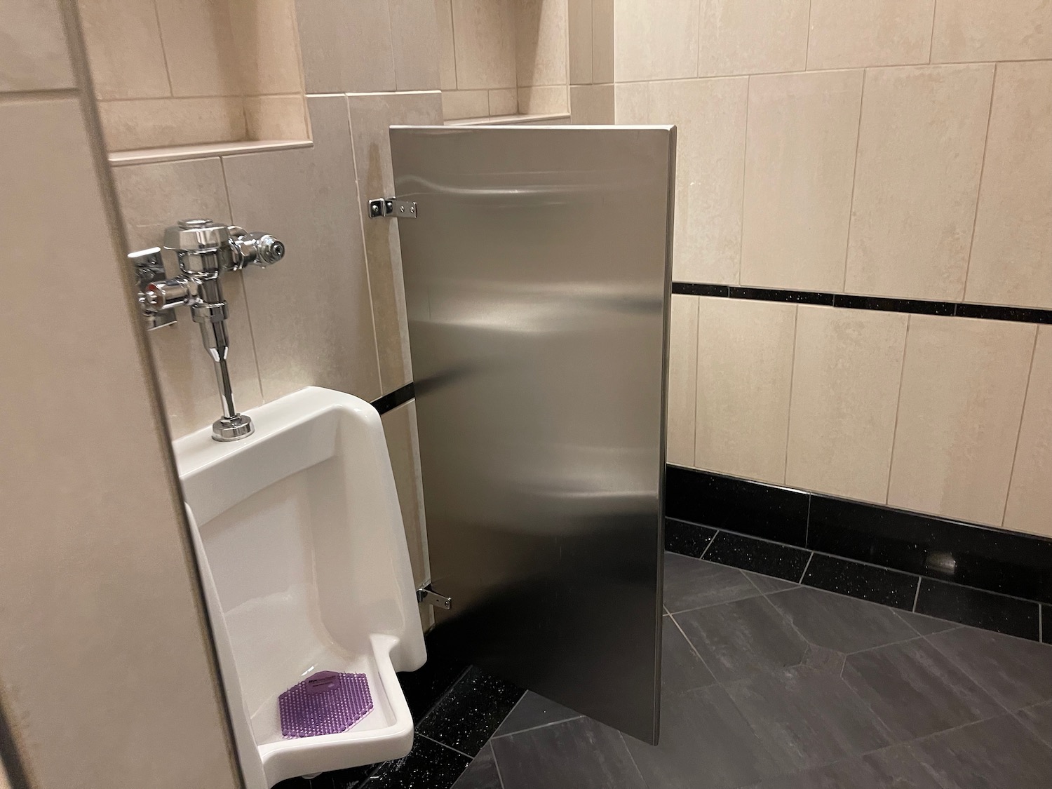 a urinal in a bathroom